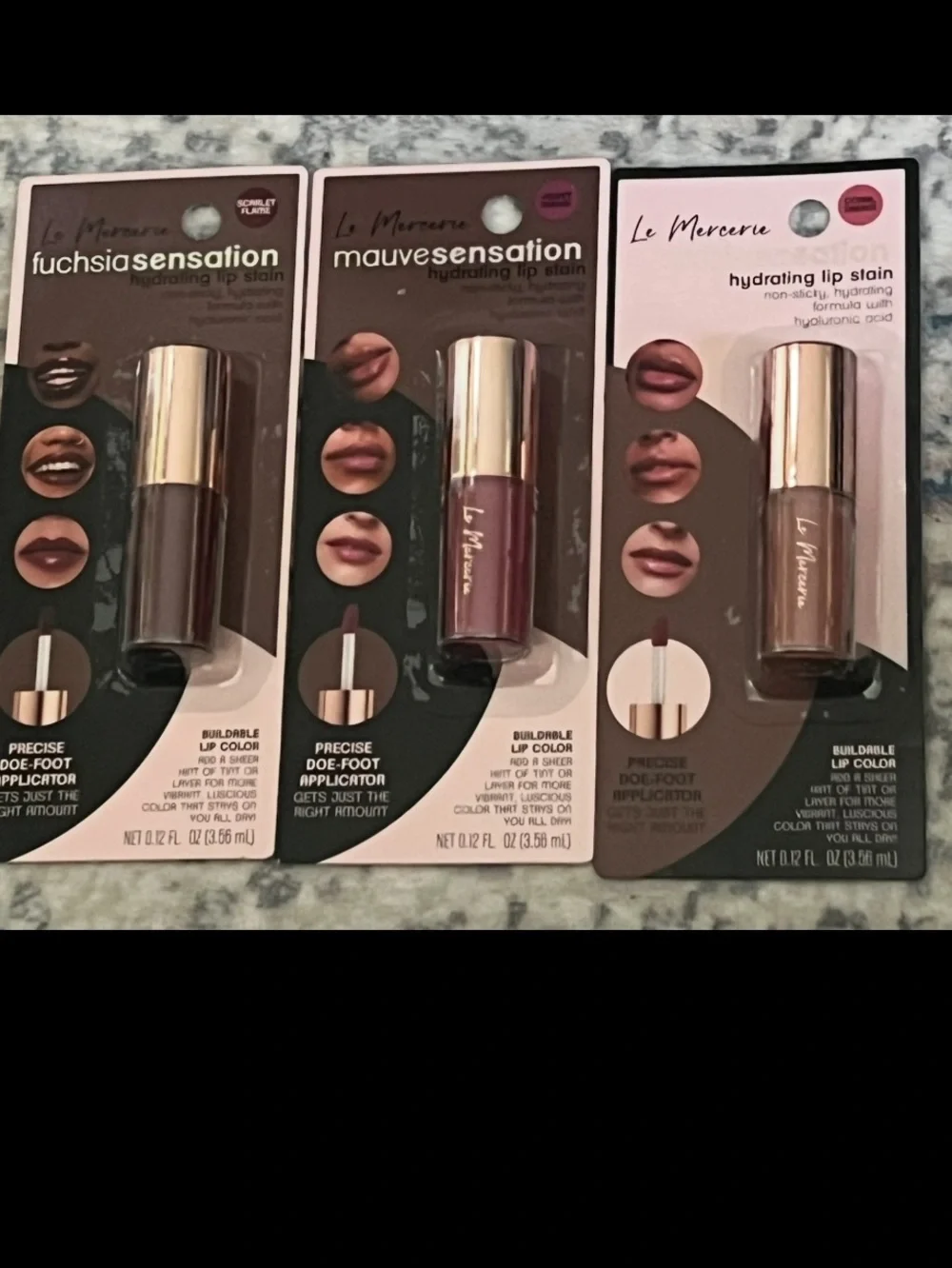 Le Mercerie Hydrating Lip Stain: scarlet flame/ velvet mauve/ coral dream.